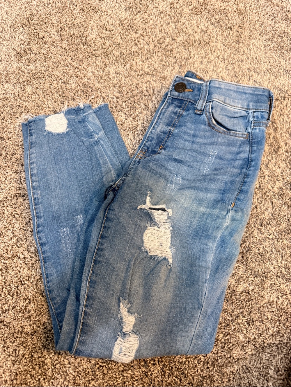 SO Light Wash Ripped Skinny Jeans